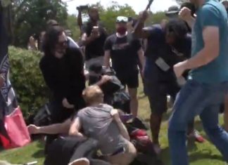 Bloedige vechtpartijen tussen gewapende rivaliserende groepen demonstranten