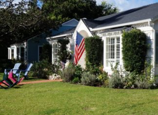 BLM-linksen dreigen huis af te branden voor het tonen van Amerikaanse vlag