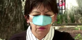 Links pusht “alleen-neus” Covid-maskers voor eten en drinken