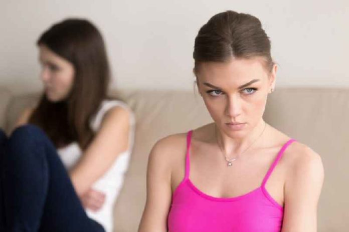 grumpy-woman-sitting-offended-girlfriend_1163-4408 Freepik