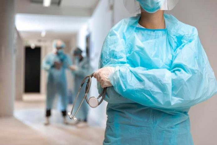 front-view-doctor-wearing-protective-wear-hospital arts